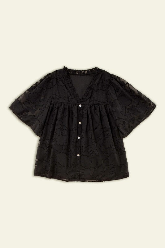 A line blouse with ruffle trim